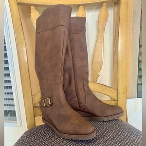 Women’s brown wedge boots. Size: 10w  NWOT never worn